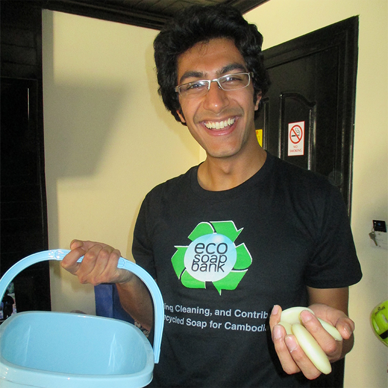 Samir Lakhami holding his Eco-Soap and a bucket