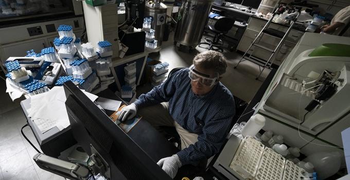 Daniel Bain working in a science lab