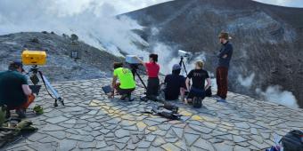 Students on volcano rim.